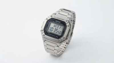 Casio W-218HD watch with metal-look bezel and steel band