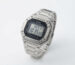 Casio W-218HD watch with metal-look bezel and steel band